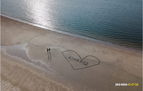 Zwangerschapsfotoshoot strand en industrie